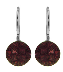 18kt white gold invisible set hanging ruby earrings.
