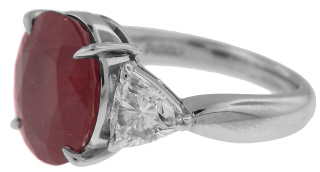 Platinum oval ruby and trillion diamond ring