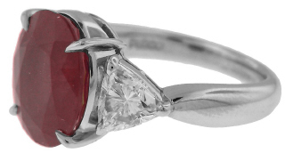 Platinum oval ruby and trillion diamond ring