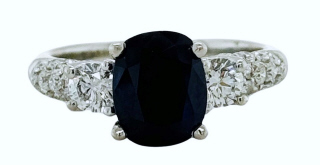 14kt white gold sapphire and diamond ring.