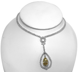 Platinum hanging pear shape diamond necklace.