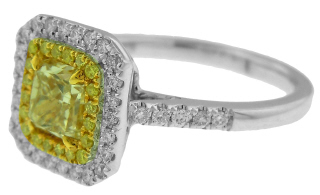 18kt white gold fancy yellow diamond ring.