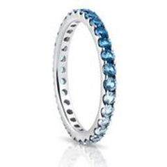 18kt white gold sapphire ombre eternity band.