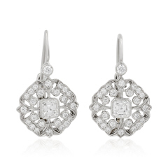 Platinum hanging diamond earrings.