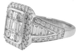 18kt white gold round and baguette diamond ring.