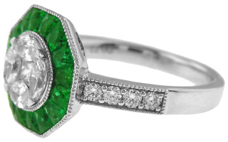 18kt white gold emerald and diamond ring.