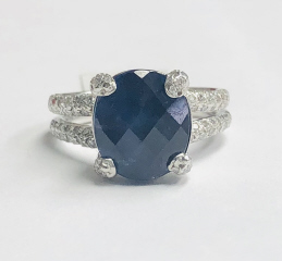 Platinum ring with checkerboard cut sapphire and diamonds