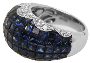 Platinum invisible set sapphire and diamond ring.