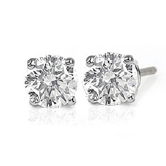 Platinum Tiffany & Co. diamond stud earrings with screw backs.