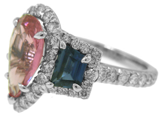 Platinum pear shape pink sapphire, diamond, and blue sapphire ring