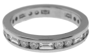 Platinum channel set round and baguette diamond band.