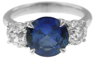 Platinum sapphire and diamond three stone ring