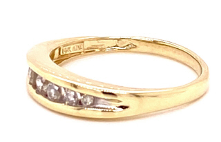 14kt yellow gold channel set half around diamond band