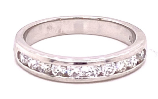 Platinum channel set diamond half around band