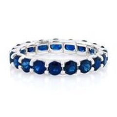 18kt white gold shared prong sapphire eternity band
