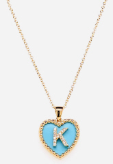 14kt yellow gold small turquoise heart pendant with diamond "K" inital and beaded edge.