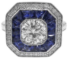 18kt white gold french cut sapphire and diamond ring.