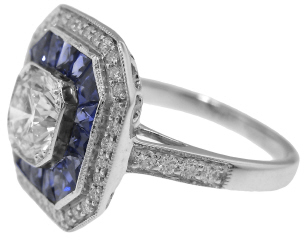 18kt white gold french cut sapphire and diamond ring.