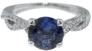 18kt white gold round sapphire and diamond ring