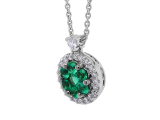 18kt white gold emerald and diamond pendant with chain.