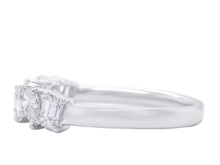 18kt white gold mixed cut diamond band.