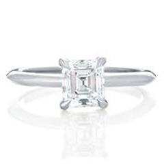 Platinum emerald cut diamond solitaire engagement ring