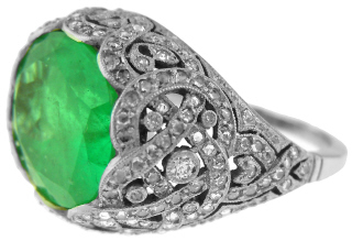 Platinum oval emerald and diamond ring