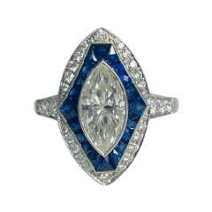 Platinum marquise, round and sapphire ring