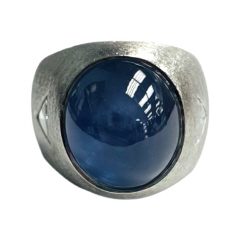 Gents platinum star sapphire and diamond ring.