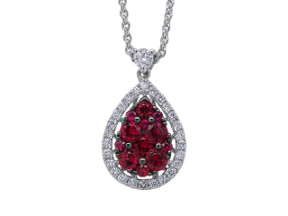 18kt white gold ruby and diamond pendant with chain.