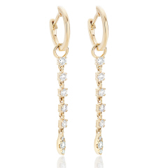 14kt yellow gold small hoop earrings with diamond dangle charm.