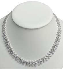 18kt white gold round and pearshape diamond necklace