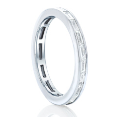 Platinum channel set baguette diamond eternity band.