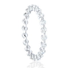 Platinum single prong diamond eternity band.