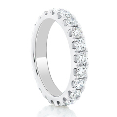 Platinum split prong diamond eternity band.