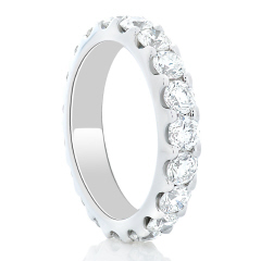 Platinum shared prong diamond eternity band.