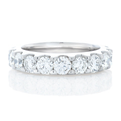 Platinum shared prong diamond eternity band.