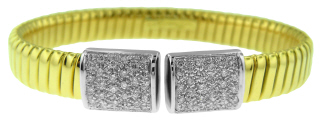 18kt two-tone flexible cuff bangle bracelet with pave diamond ends.