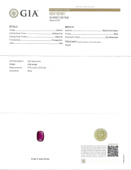 18kt white and yellow gold cushion ruby and trillion diamond ring