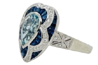 Platinum bezel set pear shape Aqua and sapphire ring