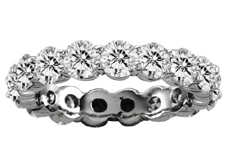 Platinum common prong diamond eternity wedding band