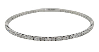 14kt white gold flexible half way diamond bangle bracelet.