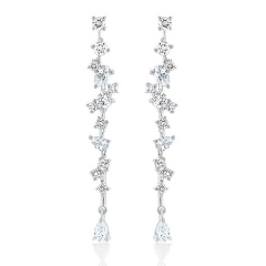 14kt white gold round and pear shape diamond dangle earrings.