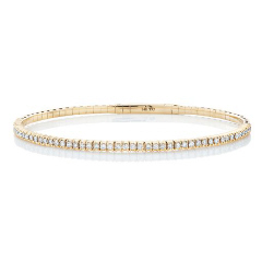 14kt yellow gold flexible diamond bracelet.