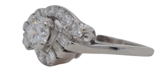 Platinum round and baguette diamond ring