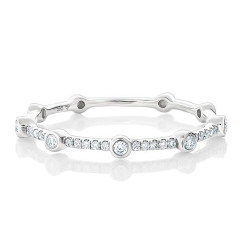 14kt white gold diamond band with bezel set diamonds.