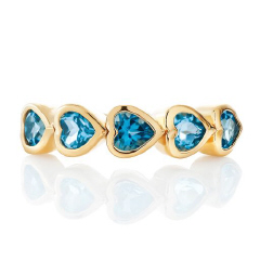 14kt yellow gold bezel set blue topaz heart band.