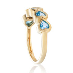 14kt yellow gold bezel set blue topaz heart band.