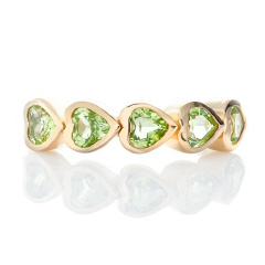 14kt yellow gold peridot bezel set heart band.