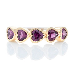 14kt yellow gold bezel set rhodolite heart band.